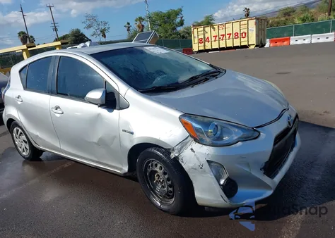 2015 Toyota Prius C Four/One/Three/Two из США, поврежденный, VIN JTDKDTB36F1578113
